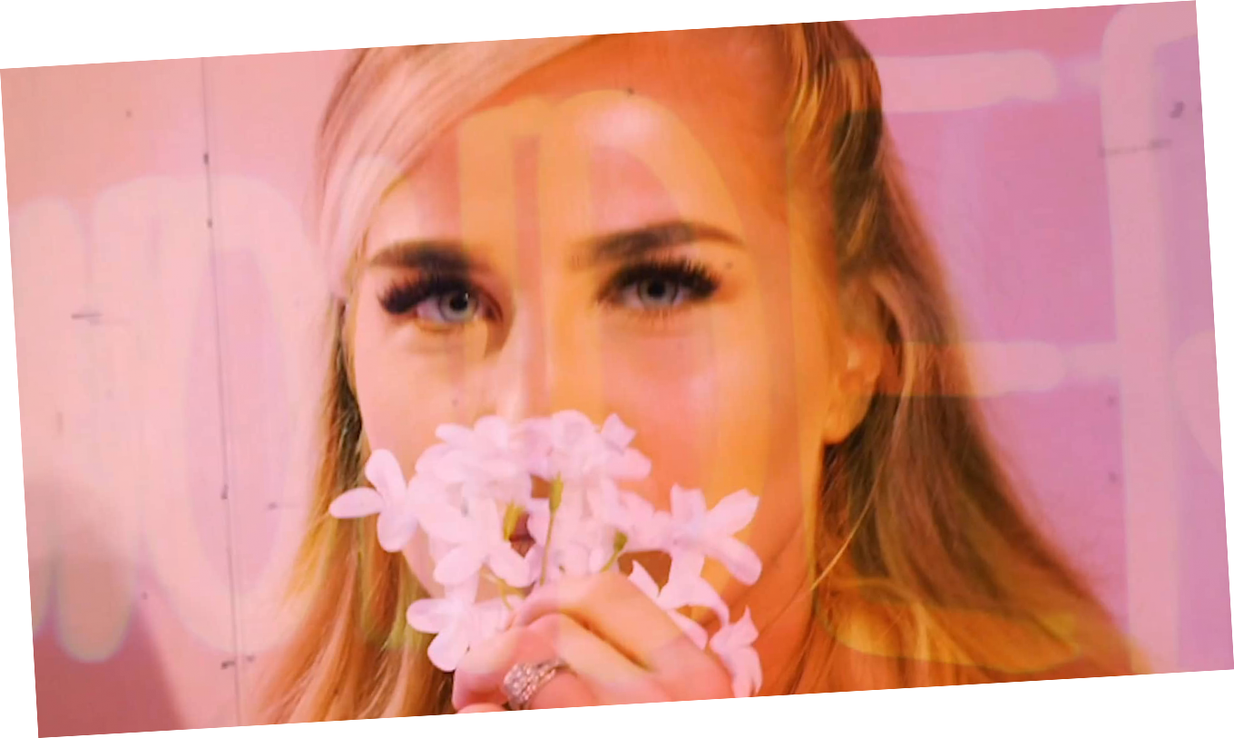 Blonde Haired Girl with Ring and Flowers | Creatif Media Group